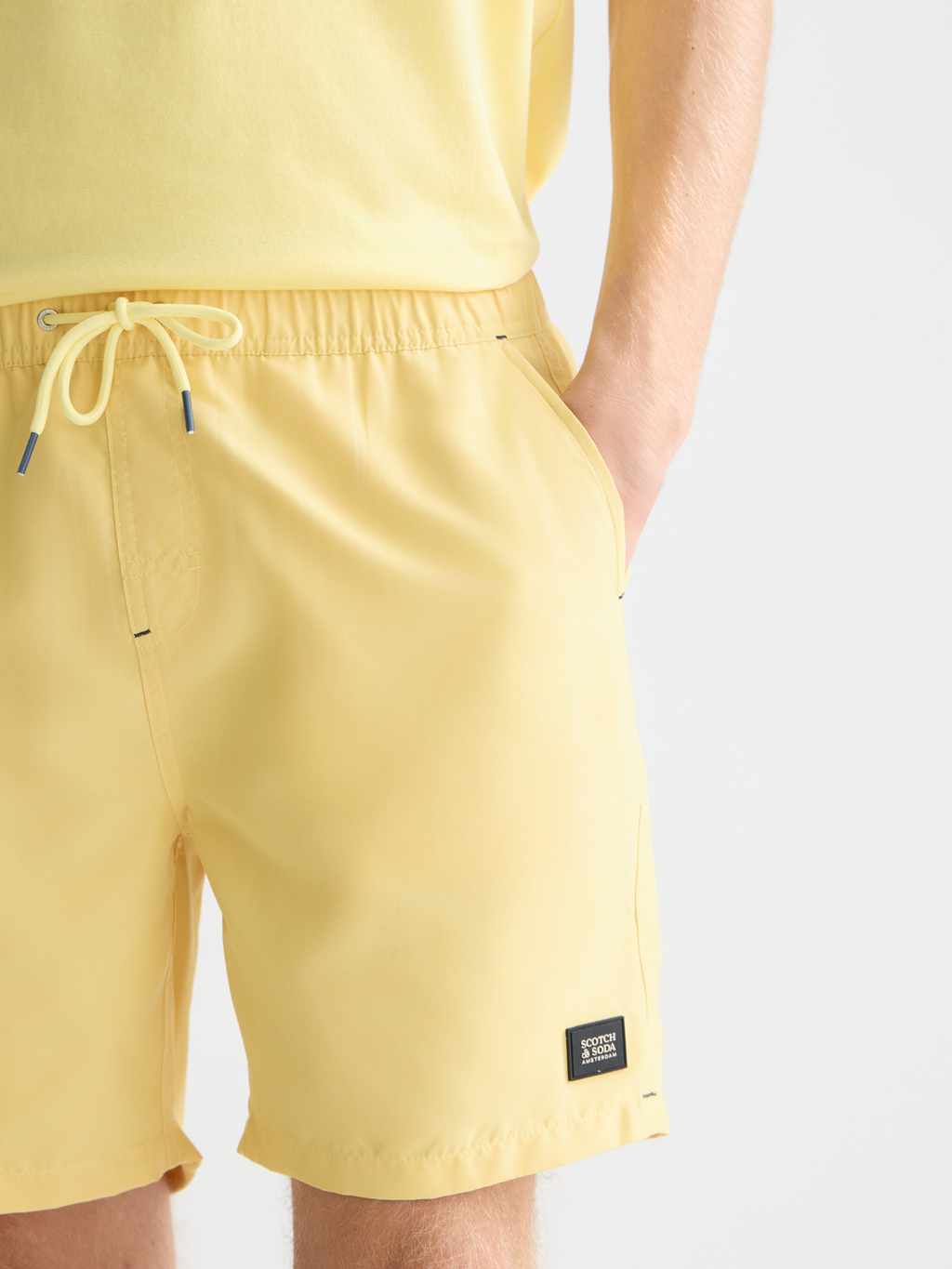 Einfarbige mittellange Badeshorts