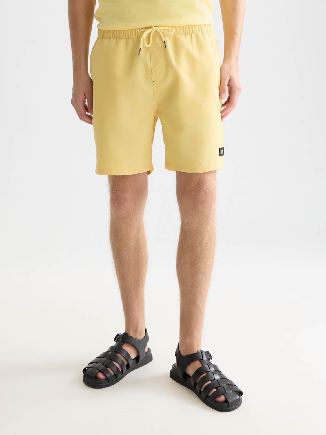 Einfarbige mittellange Badeshorts
