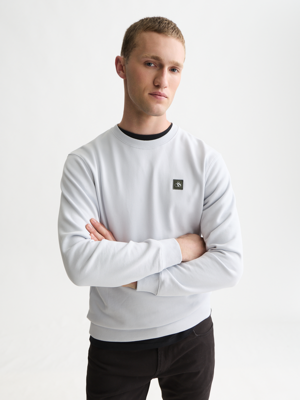 Seasonal Essentials —  Logo Badge Regularfit Sweatshirt