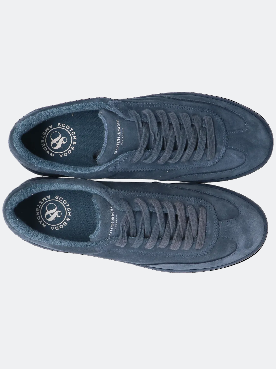 Pair of blue sneakers on a white background