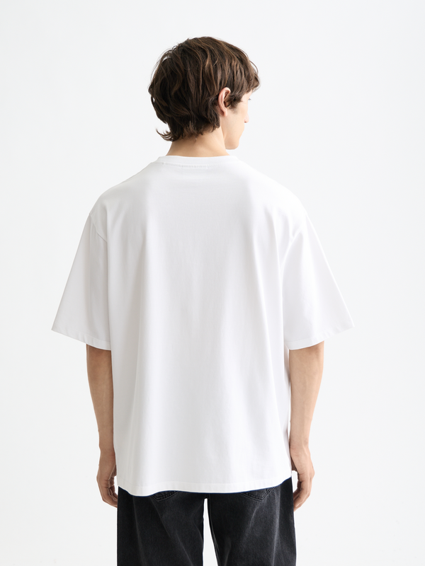 Essentials — Loose-Fit Front Pocket T-Shirt