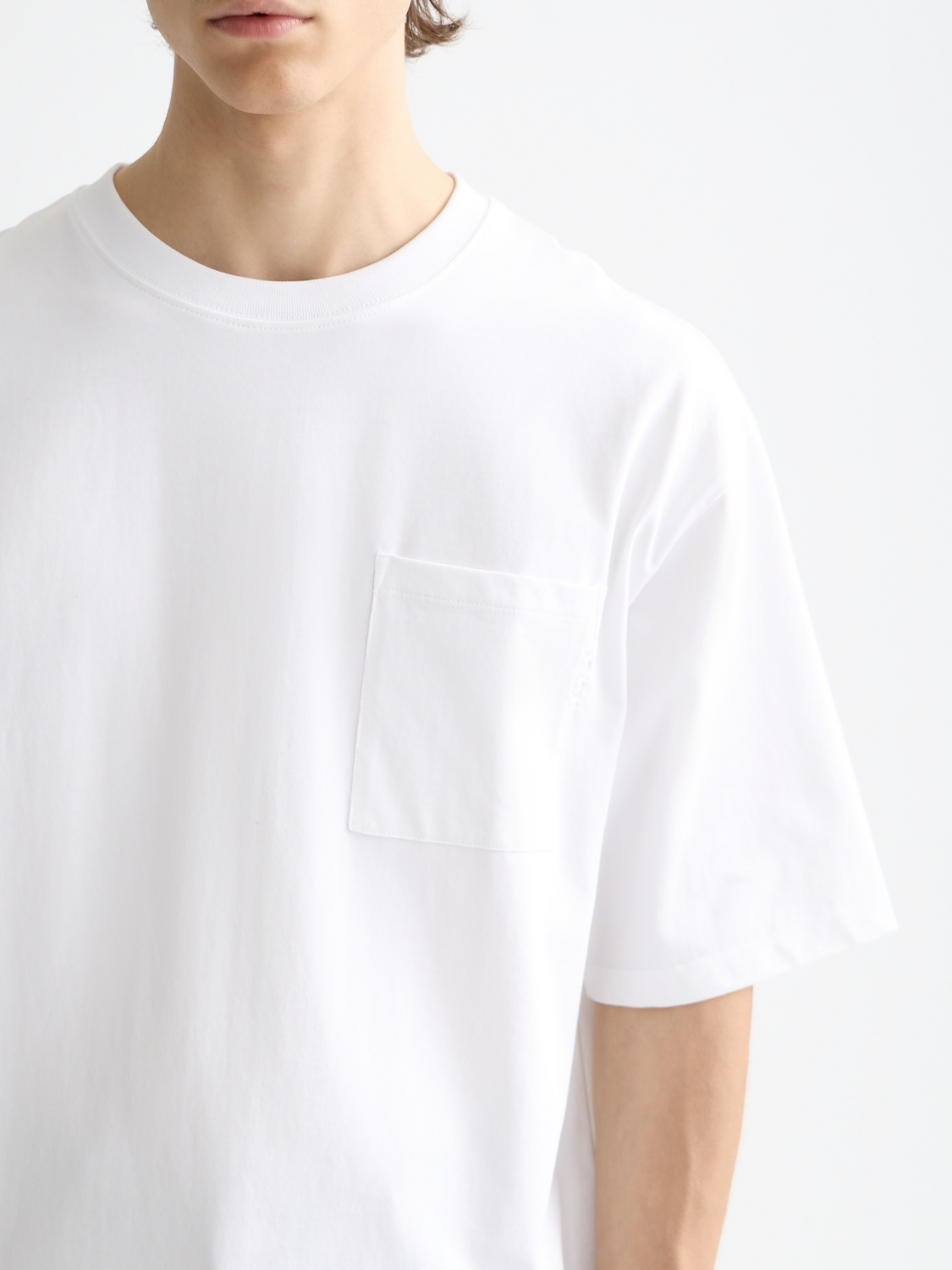 Essentials — Loose-Fit Front Pocket T-Shirt