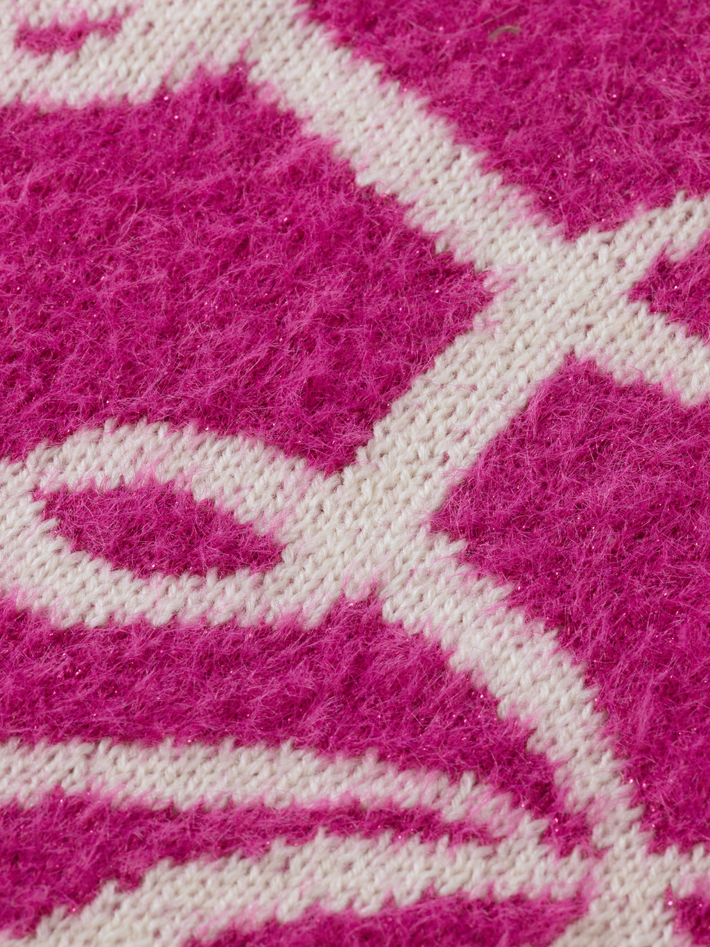 Pull col roulé en intarsia pailleté