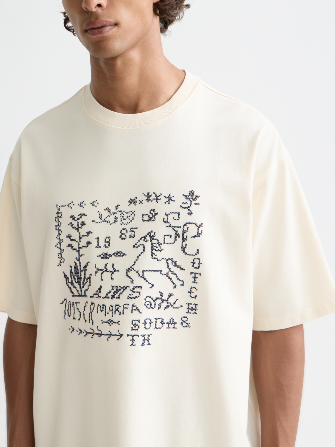 Cross-Stitched Front Artwork Loose-Fit T-Shirt