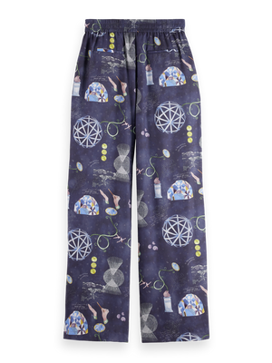 Gia - Mid rise wide leg elasticated trousers in block print